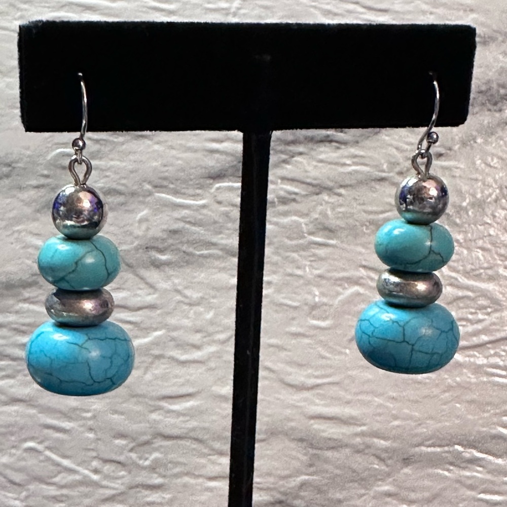 Faux turquoise and silver tone bead earrings.